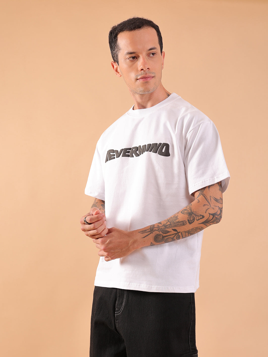 NEVERMIND White Oversized Graphic Print T-Shirt | HangerLoop Unisex Streetwear Tee